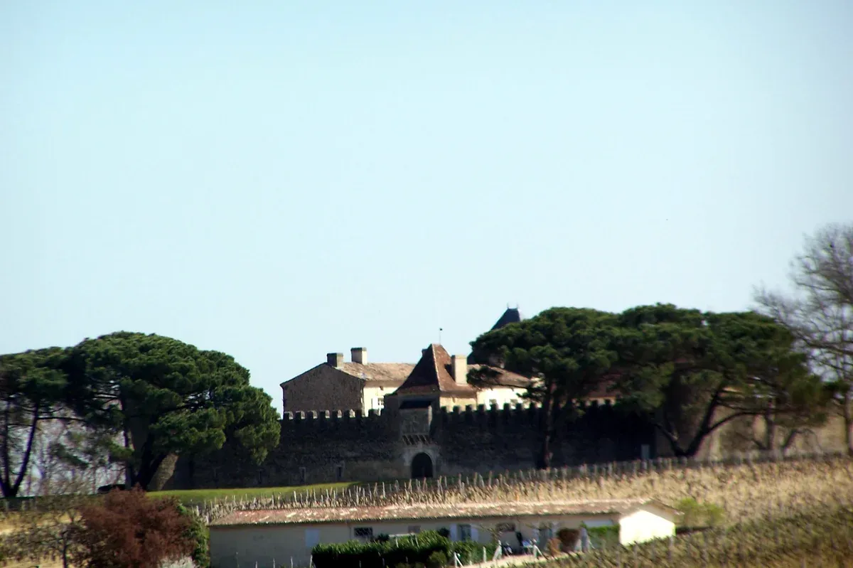 Château d'Yquem seen from the west across its vineyard in Sauternes, near Bordeaux, a destination outside the usual Bordeaux wine day tour routes